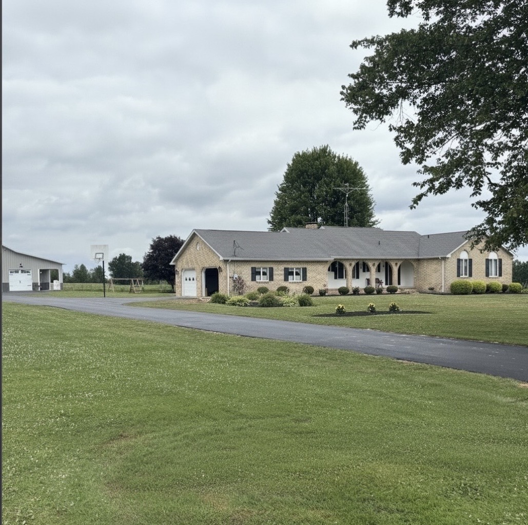 Freshly paved brick home driveway by Trumbull Paving Co.